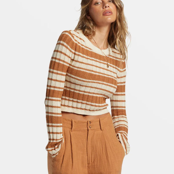 front view of the clare crew neck sweater. shows the crew neckline. also shows the ribbed detailing on the neckline, the cropped fit and the stripe design. 