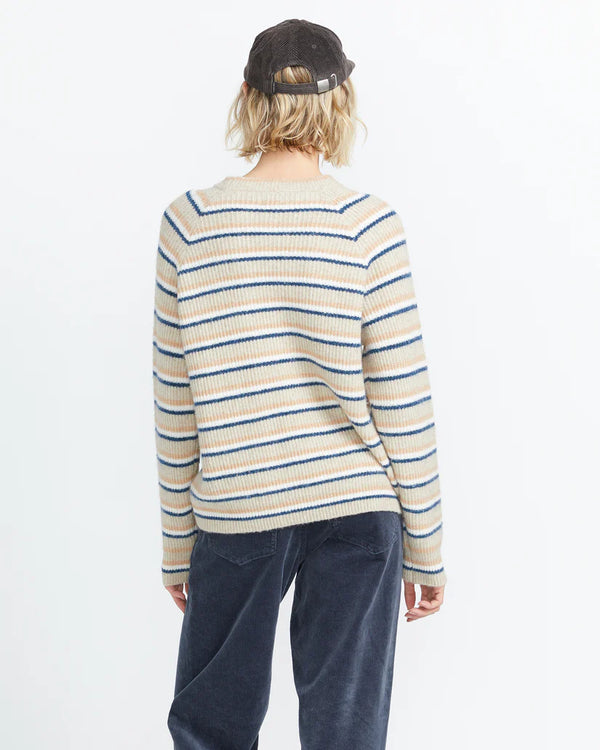 back view of the model wearing the girl guide sweater. shows the raglan sleeves. also shows the relaxed, slouchy fit. 