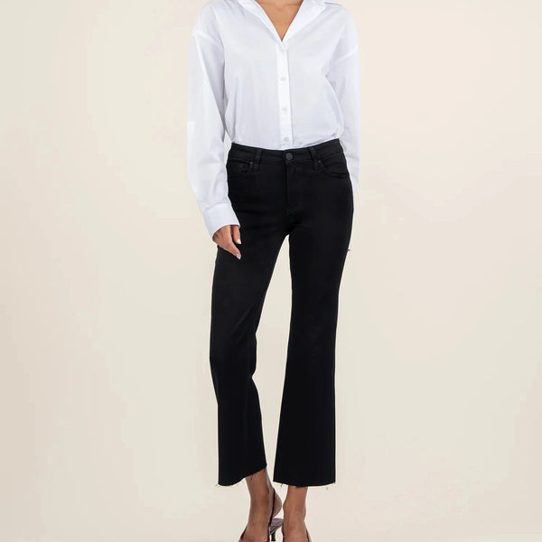 front view of the kelsey mid rise flare jeans. shows the mid rise waist. also shows the button/zipper closure, the flare bottom and raw hems. 