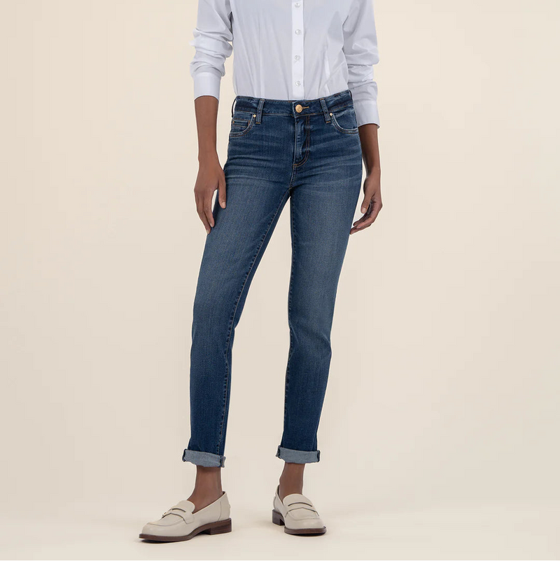 front view of the catherine boyfriend mid rise jeans. shows the mid rise. also shows the front pockets, the button/zipper closure, rolled bottom cuffs. 