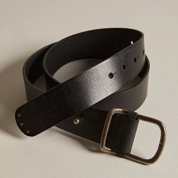 View of the WTF gallo leather belt. shows the adjustable prong closure. also shows the antique finished buckle and the black color of the belt.  