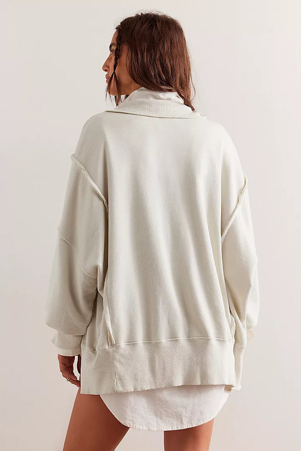 back view of the model wearing the camden henley. shows the ribbed detailing. also shows the dropped shoulder sleeves and the oversized fit. 