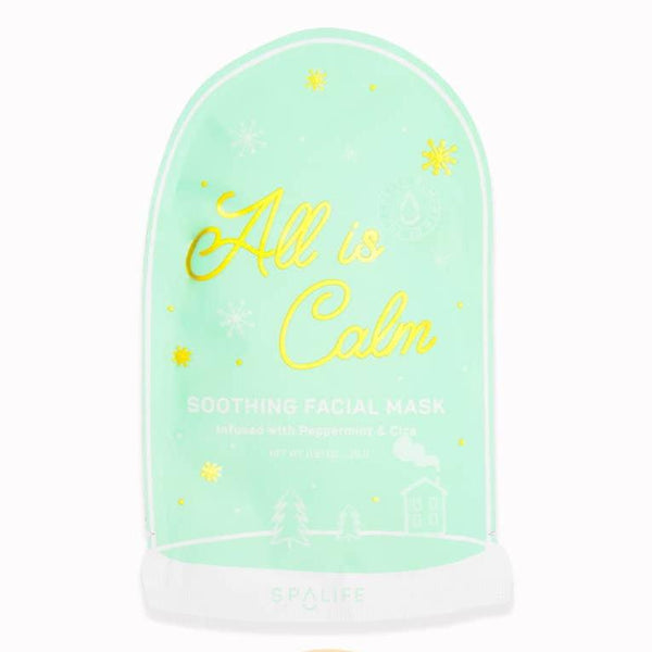 front view of the all is calm soothing facial mask. shows the mint green and gold packaging, the shape of it is a snow globe. 