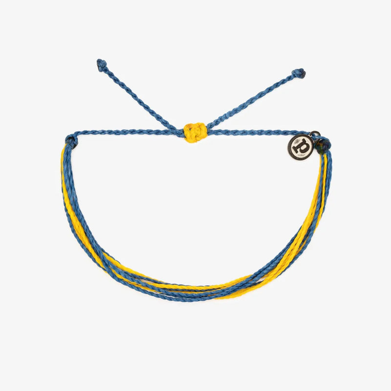 view of the light blue & yellow bracelet. shows the blue & yellow colors. also shows the pull closure and the p charm. 