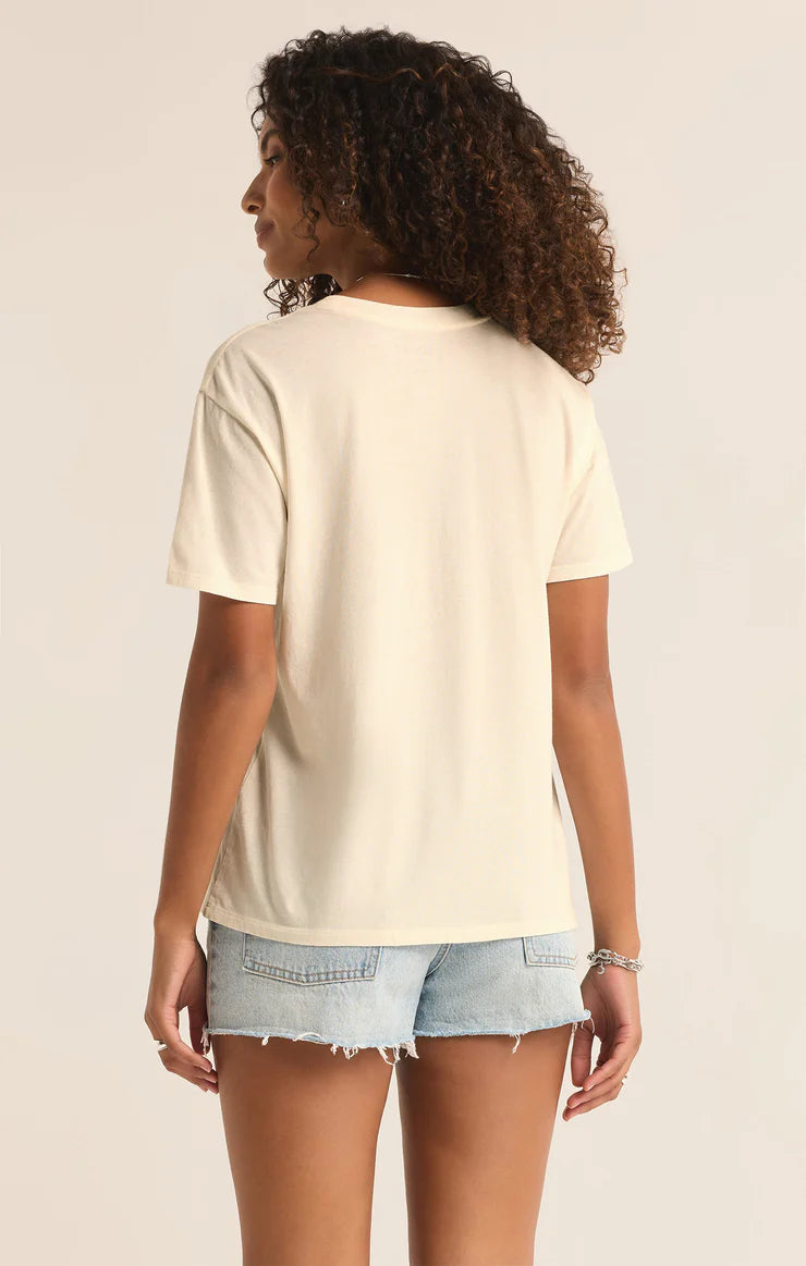 back view of the model wearing the love you boyfriend tee. shows the relaxed fit. also shows the crew neckline and the short sleeves. 