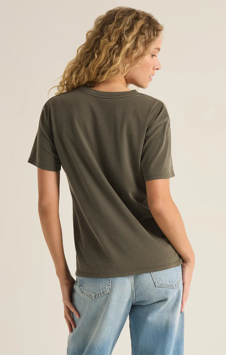 back view of the model wearing the nashville boyfriend tee. shows the vintage wash. also shows the crew neckline, the relaxed fit and the short sleeves. 