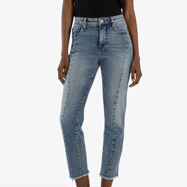 front view of the model wearing the rachael high rise fa ab ankle straight leg jeans. shows the high rise waist. also shows the defined seaming down the lg, the frayed bottom hem and the button closure. 